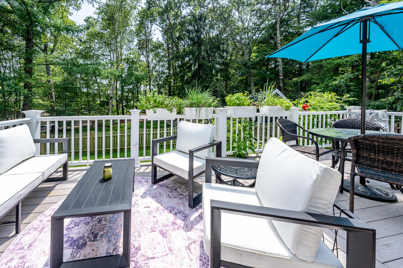157 Lumbert Mill Road Centerville, MA 02632 - Photo 31 of 42 a view of a chairs and table on the deck