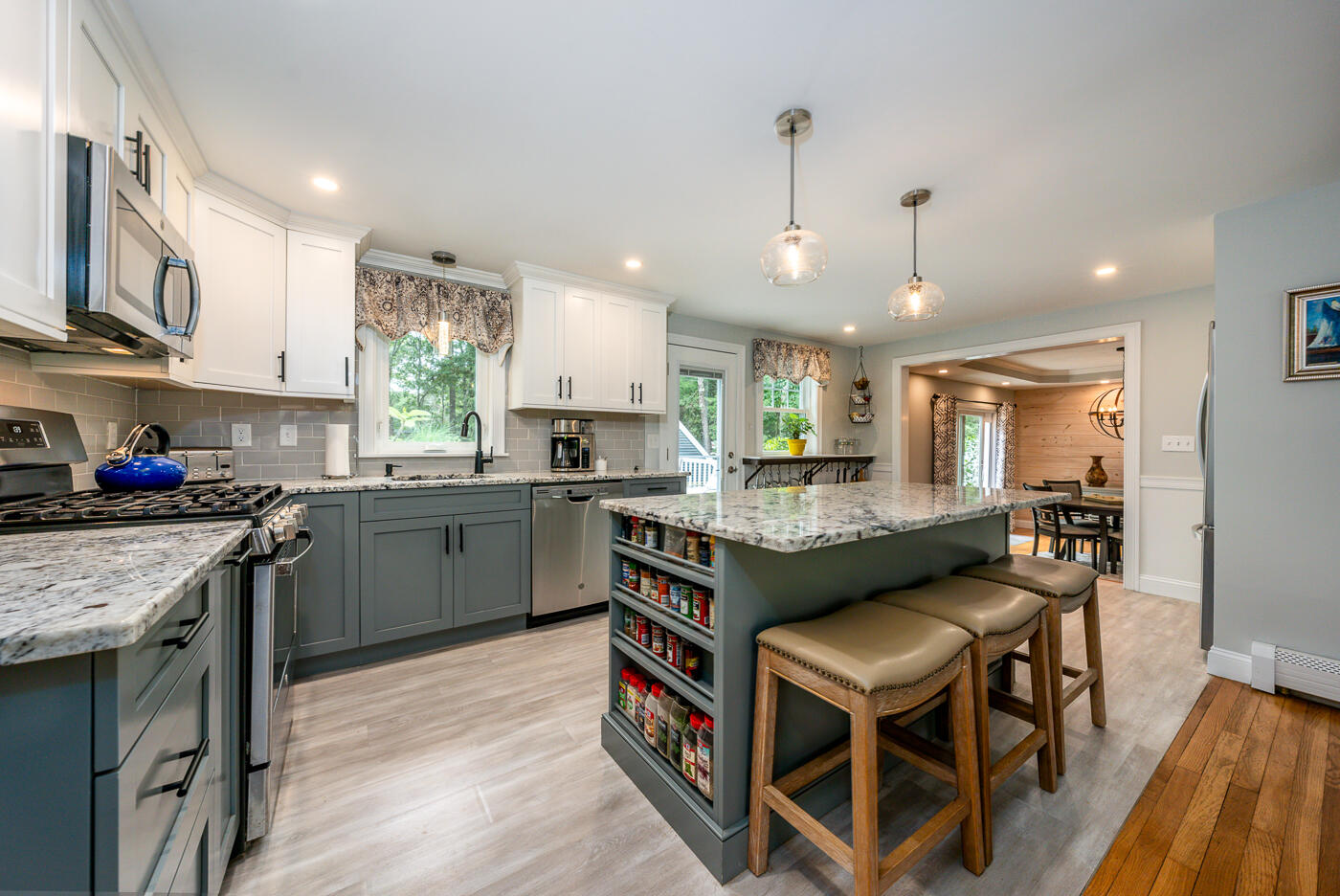 157 Lumbert Mill Road Centerville, MA 02632 - Photo 6 of 42 a kitchen with kitchen island granite countertop a sink a counter top space stainless steel appliances and cabinets