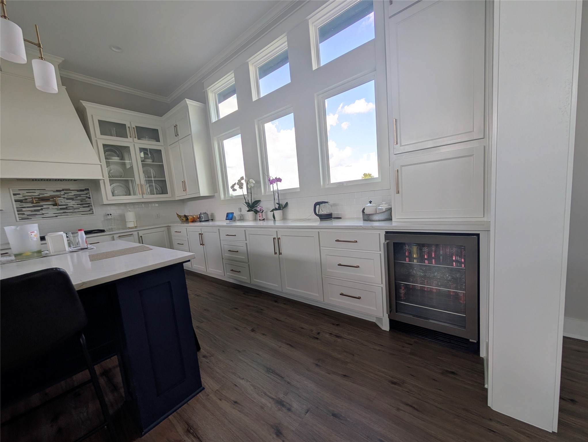 13504 Hudson Farms Road Franklin, TX 77856 - Photo 47 of 49 a kitchen with a sink cabinets and wooden floor