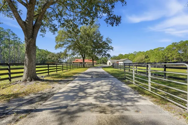 a view of a livingroom with furniture and a flat screen tv