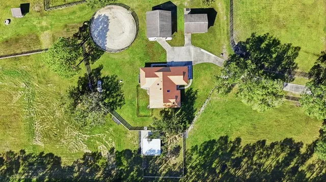 a view of a dining room with furniture and window