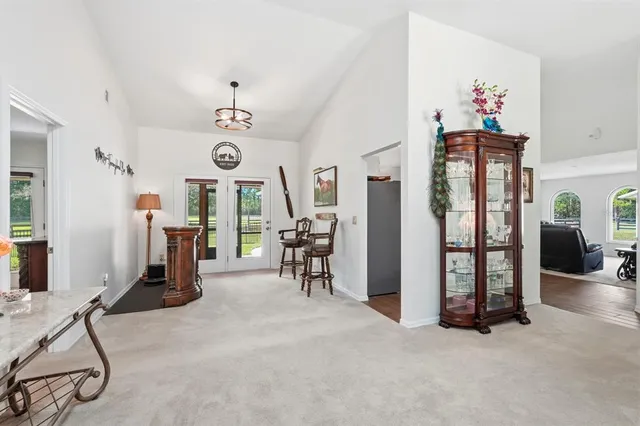 a bathroom with a double vanity sink a toilet and a mirror