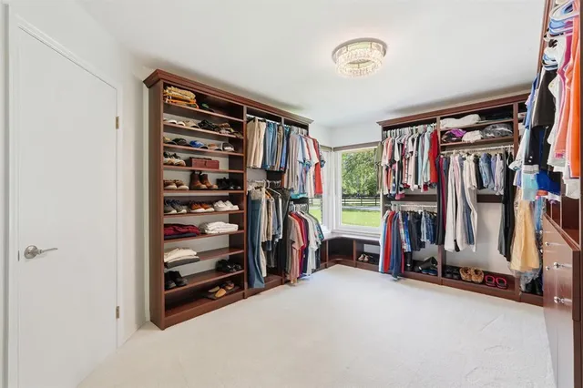 a front view of a house with yard porch and a yard