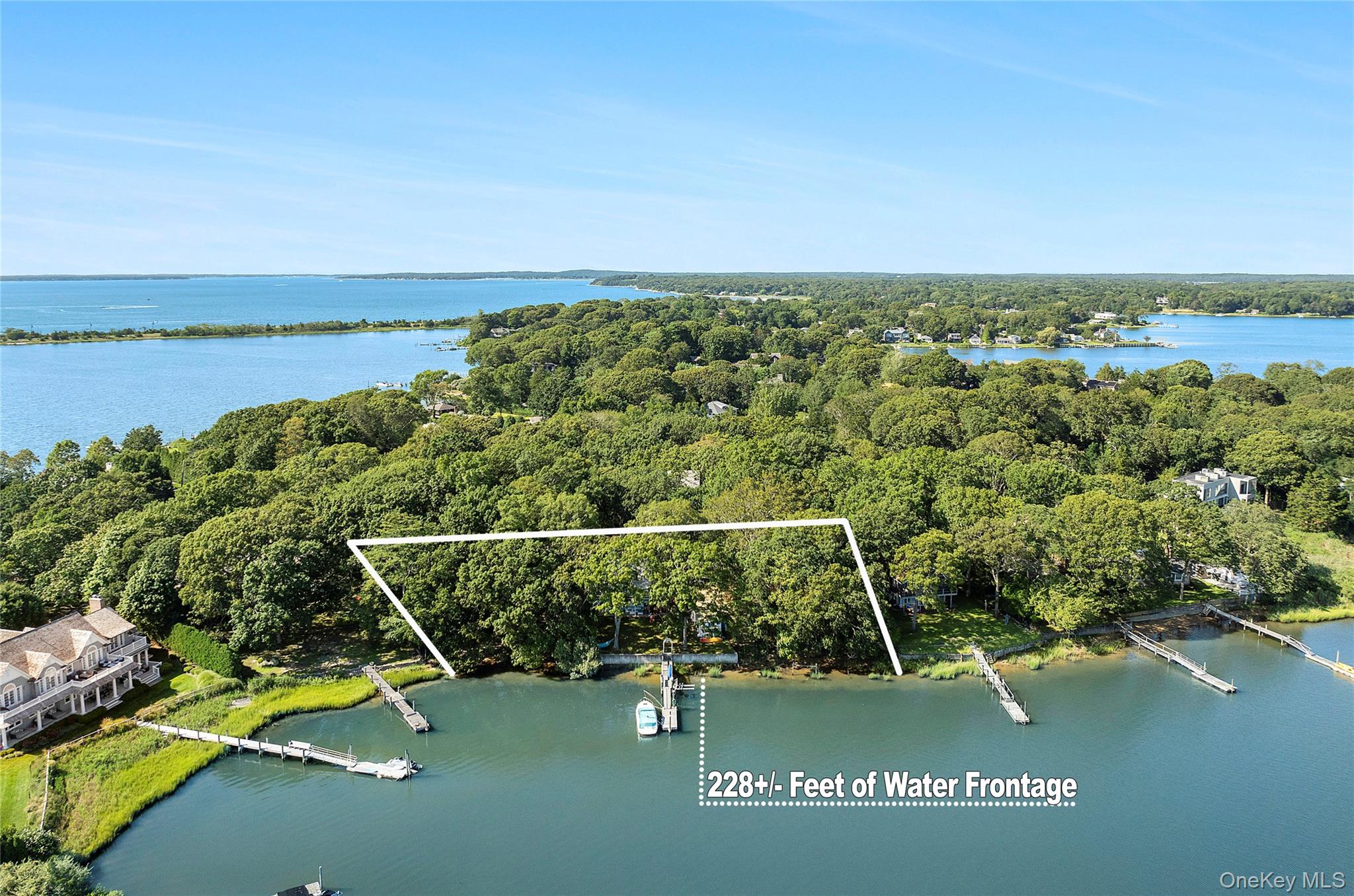 210 Redwood Road Sag Harbor, NY 11963 - Photo 2 of 26 a view of a tennis court