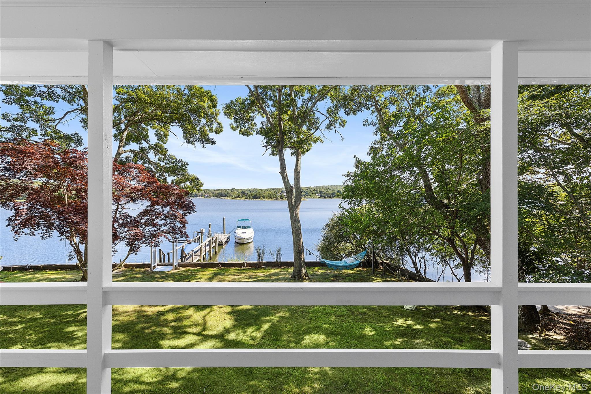210 Redwood Road Sag Harbor, NY 11963 - Photo 24 of 26 a view of swimming pool from a yard
