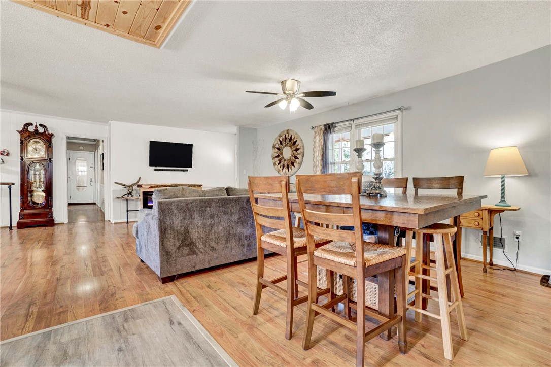 133 Old Liberty Pickens Road Pickens, SC 29671 - Photo 17 of 48 This inviting space features natural wood flooring and ample natural light, perfect for everyday living.