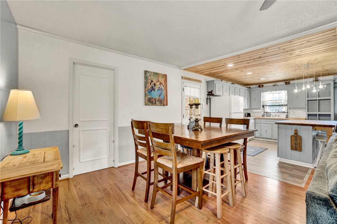133 Old Liberty Pickens Road Pickens, SC 29671 - Photo 18 of 48 This inviting space combines a cozy dining area with an efficient kitchen.