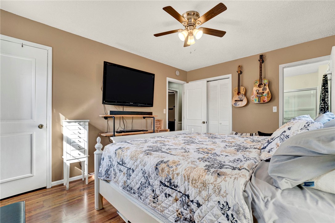 133 Old Liberty Pickens Road Pickens, SC 29671 - Photo 22 of 48 This inviting bedroom offers comfort and classic hardwood flooring.