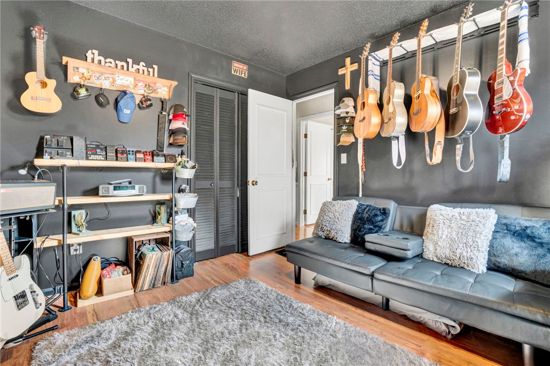 133 Old Liberty Pickens Road Pickens, SC 29671 - Photo 28 of 48 This versatile space offers warm hardwood floors, perfect for creative endeavors or relaxation.