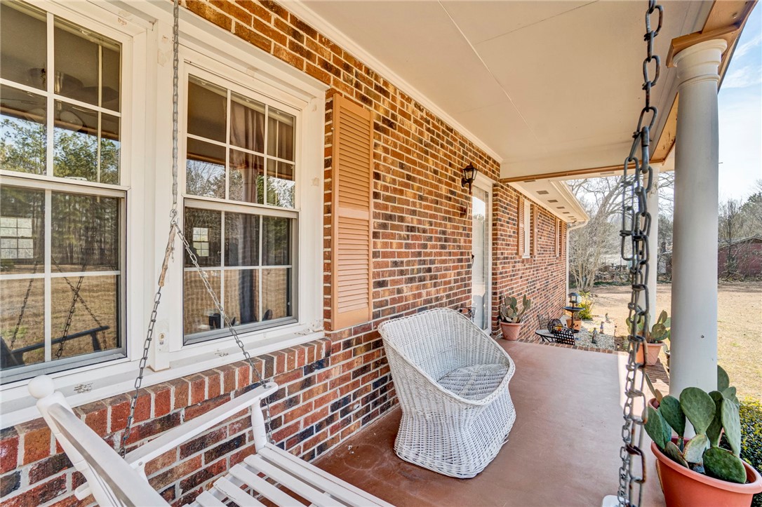 133 Old Liberty Pickens Road Pickens, SC 29671 - Photo 3 of 48 This inviting porch, perfect for relaxation, welcomes you home with classic brick construction.