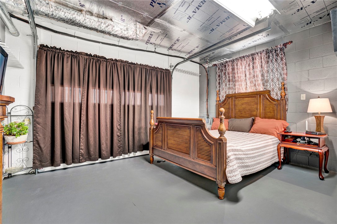 133 Old Liberty Pickens Road Pickens, SC 29671 - Photo 45 of 48 This cozy bedroom features a unique ceiling and comfortable bed for peaceful rest.