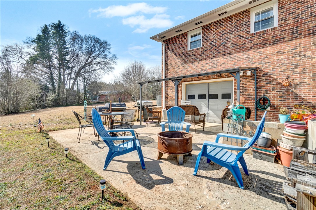 133 Old Liberty Pickens Road Pickens, SC 29671 - Photo 46 of 48 Relax on this spacious patio, ideal for outdoor gatherings and enjoying the open air.