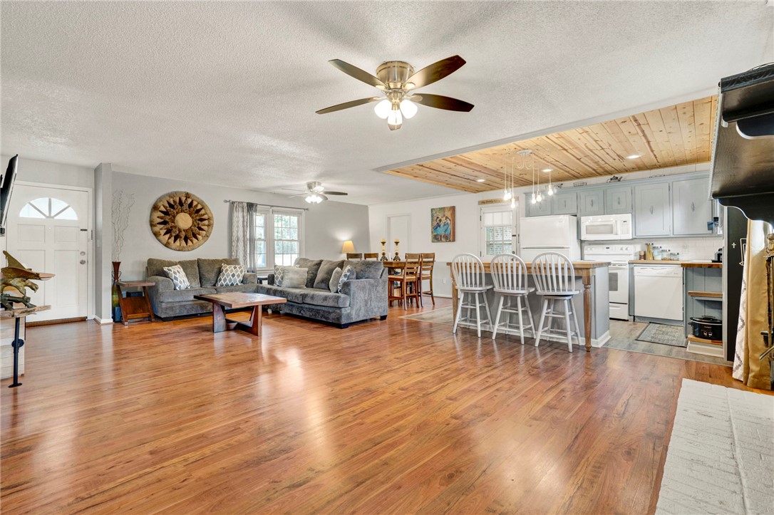 133 Old Liberty Pickens Road Pickens, SC 29671 - Photo 10 of 48 Bright and open living spaces flow seamlessly, creating an inviting atmosphere for everyday living.