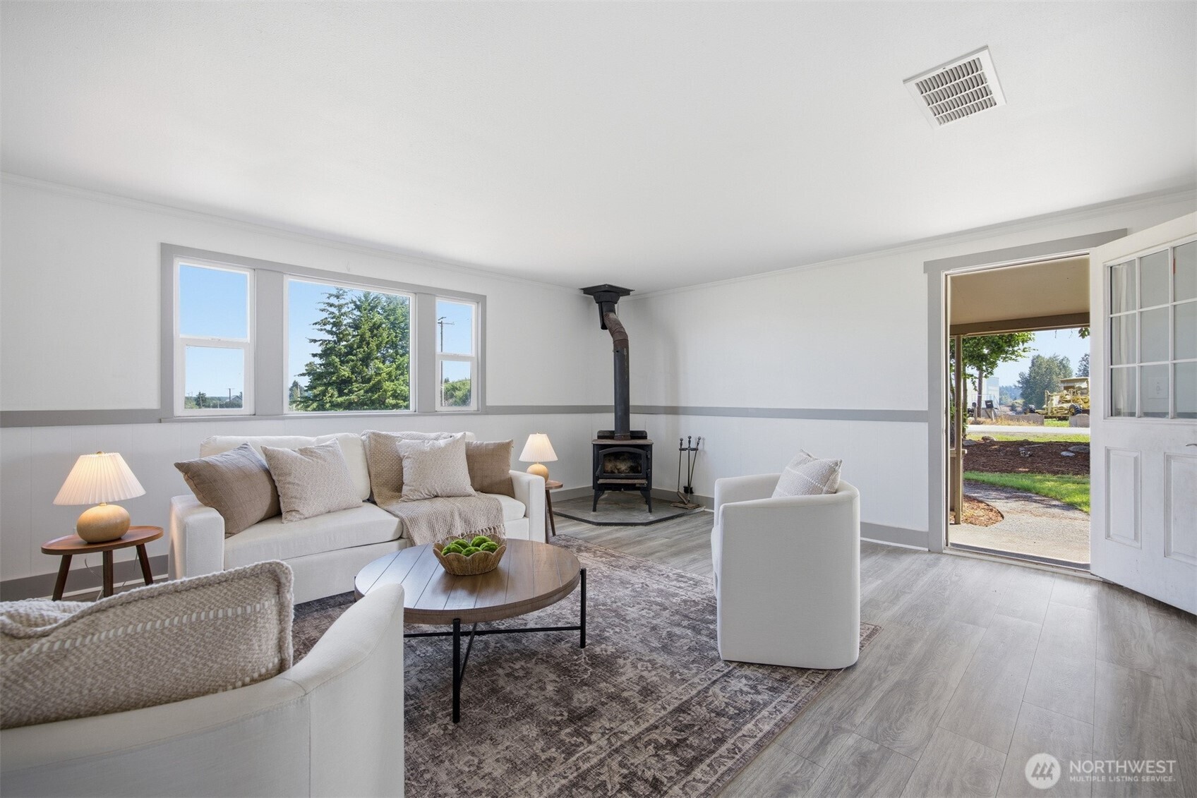 6791 Noon Road Everson, WA 98247 - Photo 6 of 38 a living room with furniture and a wooden floor