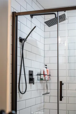 a bathroom with a sink and a shower
