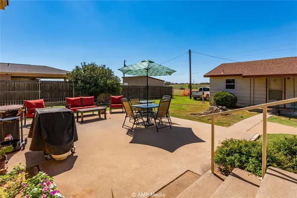 a view of outdoor space yard deck patio and outdoor kitchen