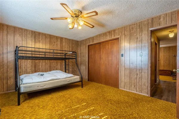 a dining table with chairs and window