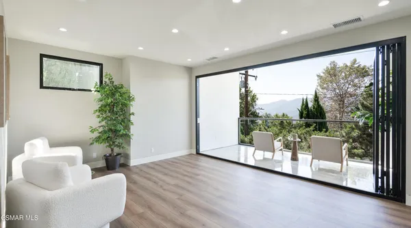 a white bath tub sitting in a bathroom