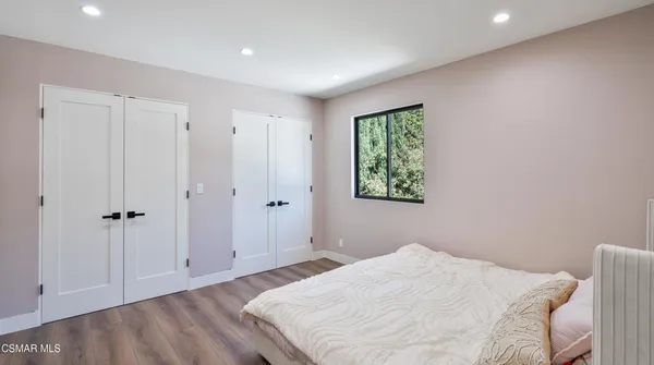 a workspace with furniture and a window