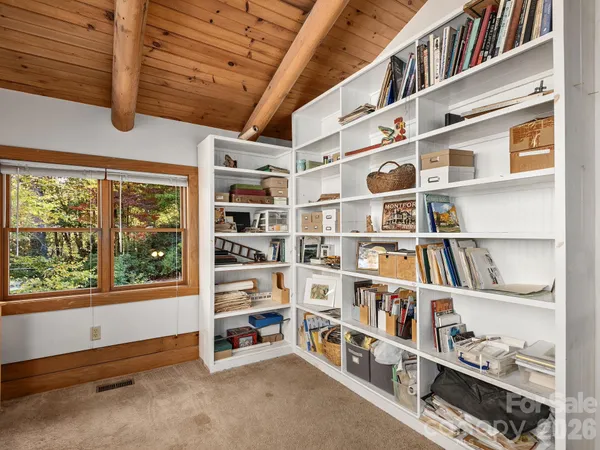 a living room with a couch and a flat screen tv