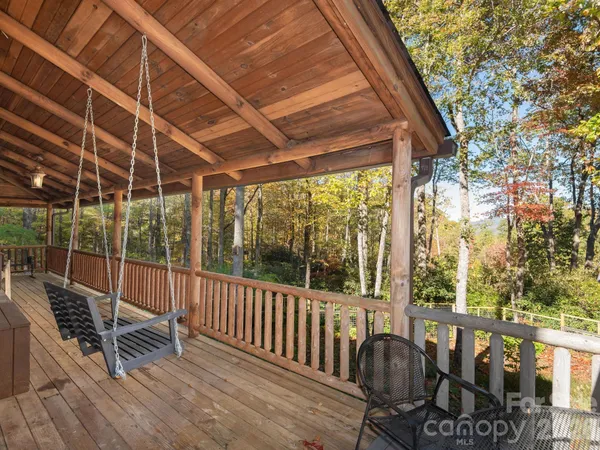 a view of balcony with wooden floor