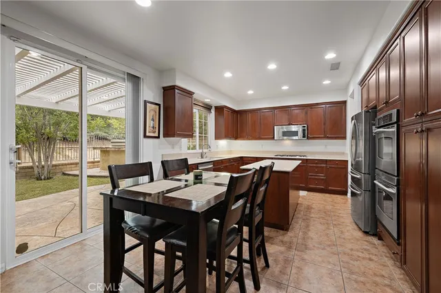 a bedroom with a bed and a television