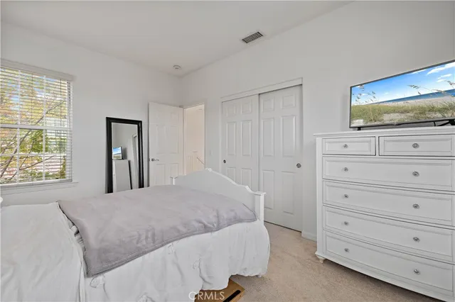 an aerial view of a house with a ocean view