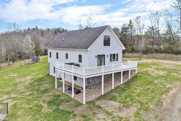 a view of yard with swimming pool