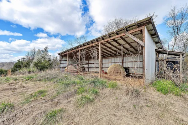 a living room with furniture or stairs and a couch