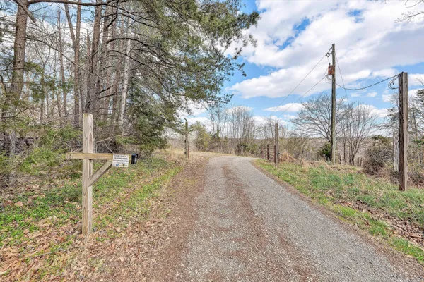 a kitchen with wooden cabinets and stainless steel appliances