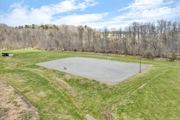 a kitchen with granite countertop stainless steel appliances and wooden cabinets