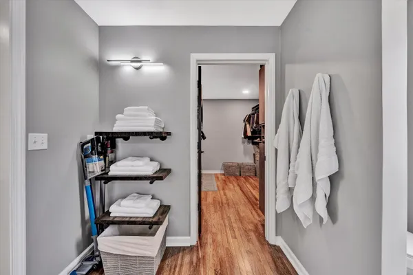 a view of an ocean with trees in the background