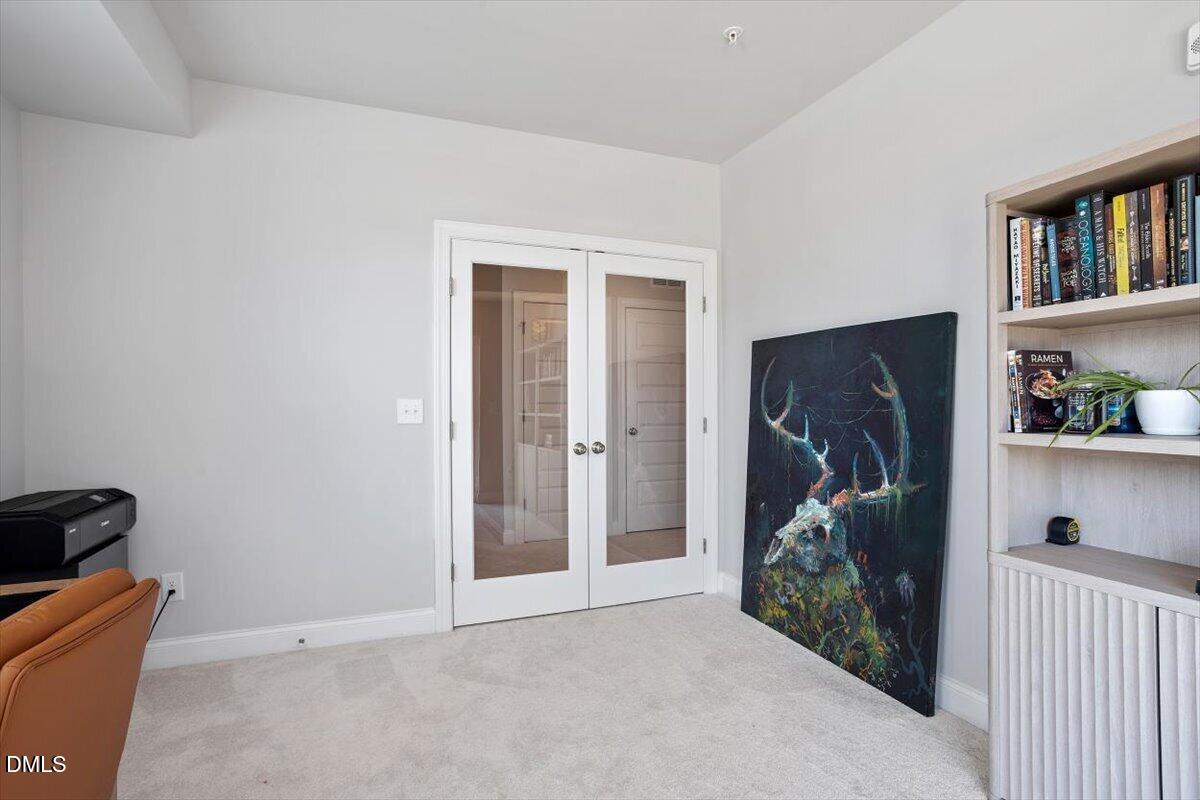 1234 Coach Sta Alley, Unit 101 Raleigh, NC 27601 - Photo 21 of 30 a view of a livingroom with walk in closet