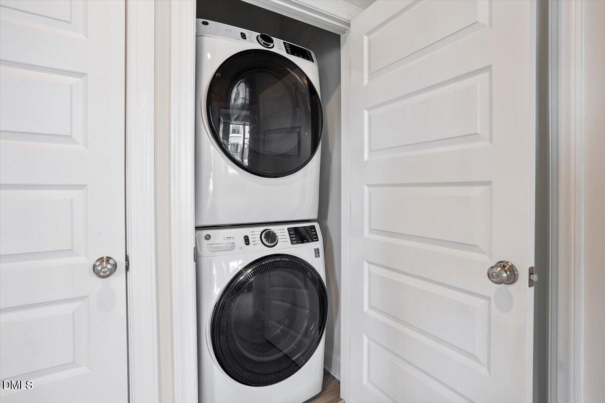 1234 Coach Sta Alley, Unit 101 Raleigh, NC 27601 - Photo 24 of 30 a utility room with dryer and washer