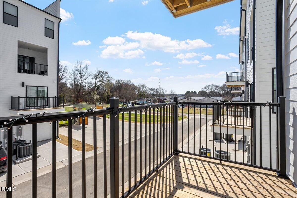 1234 Coach Sta Alley, Unit 101 Raleigh, NC 27601 - Photo 25 of 30 a view of city from a balcony