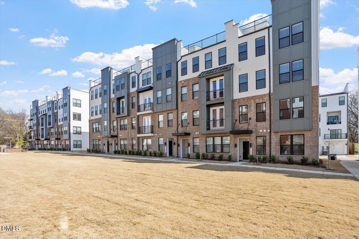 1234 Coach Sta Alley, Unit 101 Raleigh, NC 27601 - Photo 28 of 30 a view of a building with a street