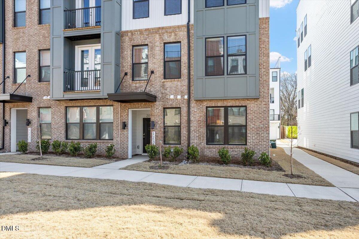 1234 Coach Sta Alley, Unit 101 Raleigh, NC 27601 - Photo 2 of 30 a front view of a building