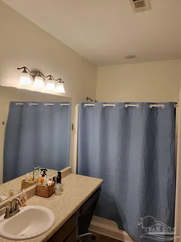 a backyard of a house with seating space