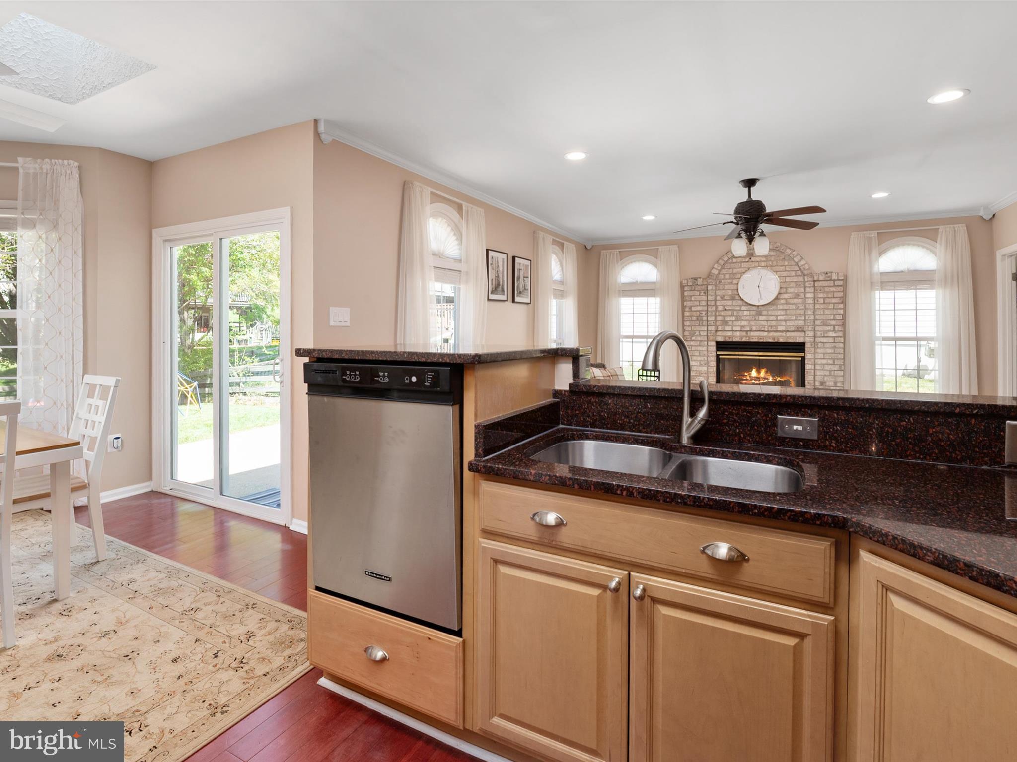 2322 Golden Chapel Road Odenton, MD 21113 - Photo 16 of 64 a kitchen with granite countertop a sink cabinets and window