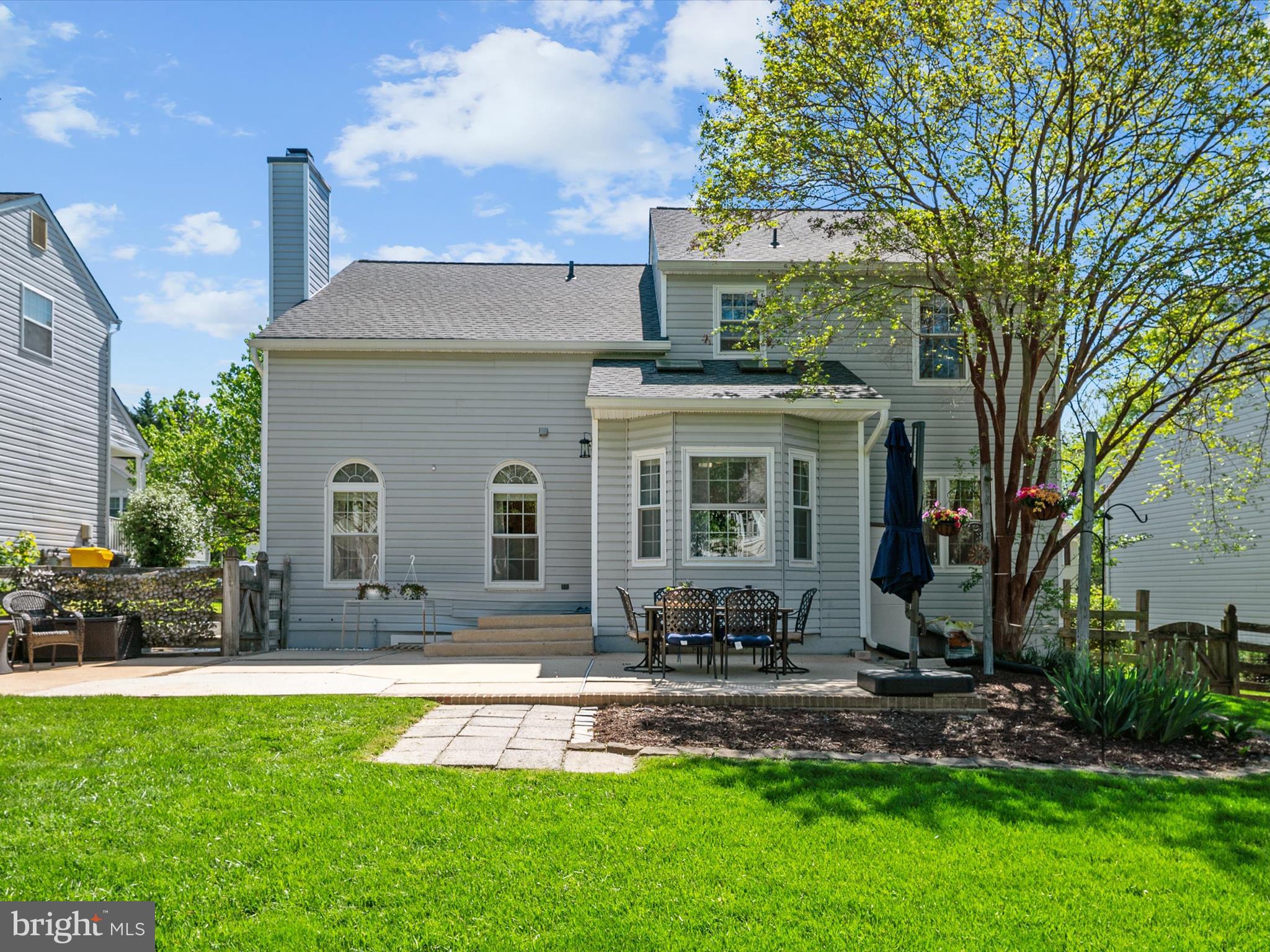 2322 Golden Chapel Road Odenton, MD 21113 - Photo 49 of 64 a front view of a house with a yard