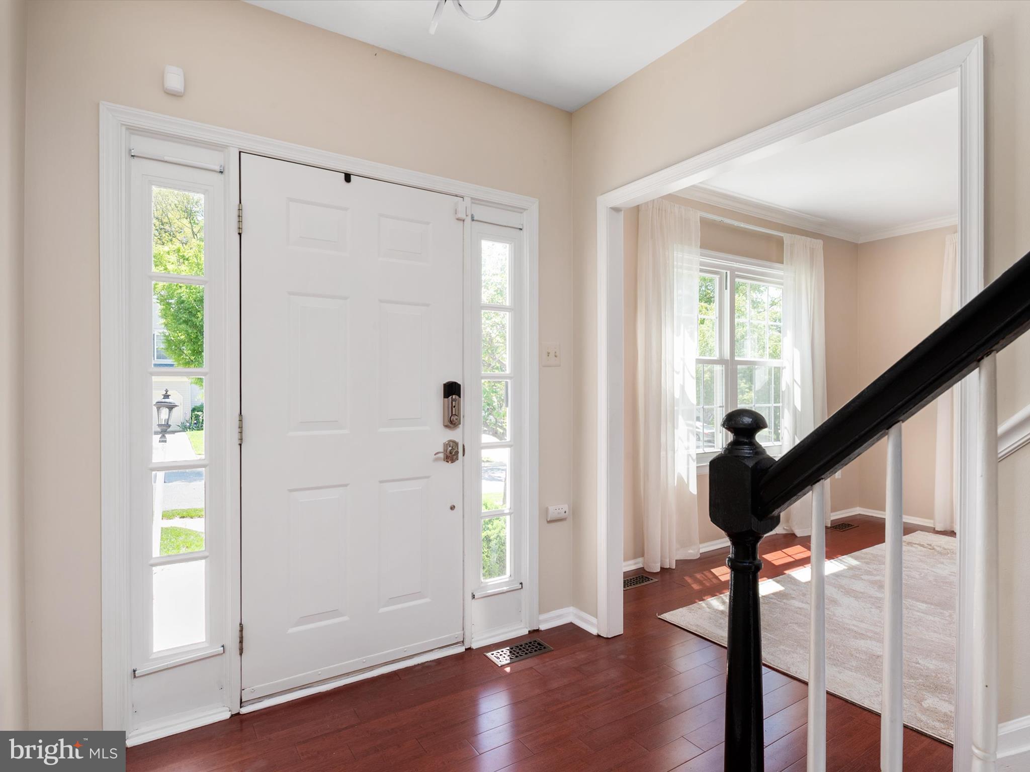 2322 Golden Chapel Road Odenton, MD 21113 - Photo 6 of 64 a view of entryway with wooden floor and stairs