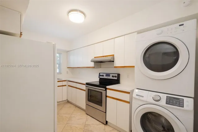 a room with a washer and dryer