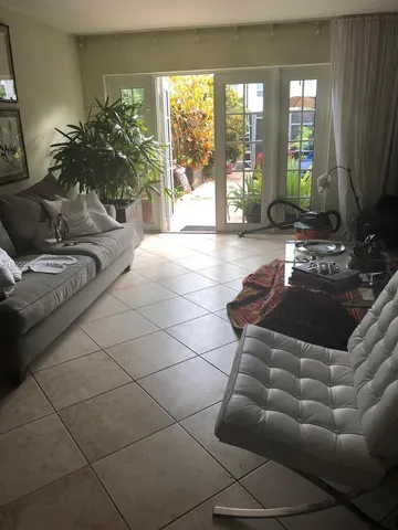 a view of a house with a back yard