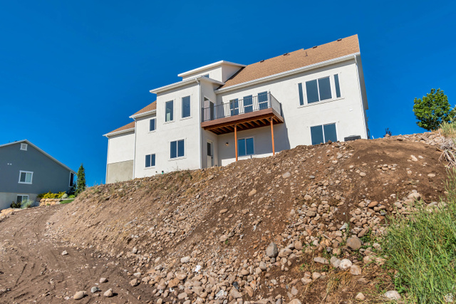 1351 Maple Circle Santaquin, UT 84655 - Photo 42 of 42 Multi-story residence featuring light-toned stucco siding and a brown shingled roof