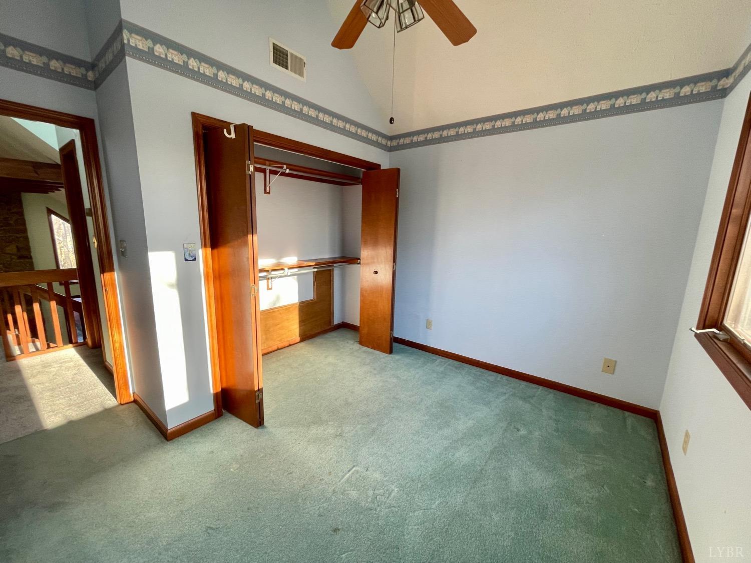 1739 Old Cifax Road Goode, VA 24556 - Photo 31 of 52 a view of an empty room with a fireplace