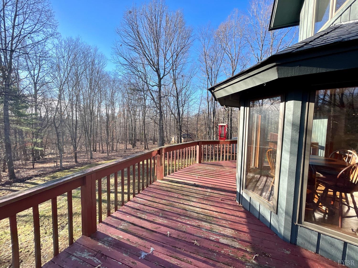 1739 Old Cifax Road Goode, VA 24556 - Photo 40 of 52 a view of balcony with wooden floor and deck