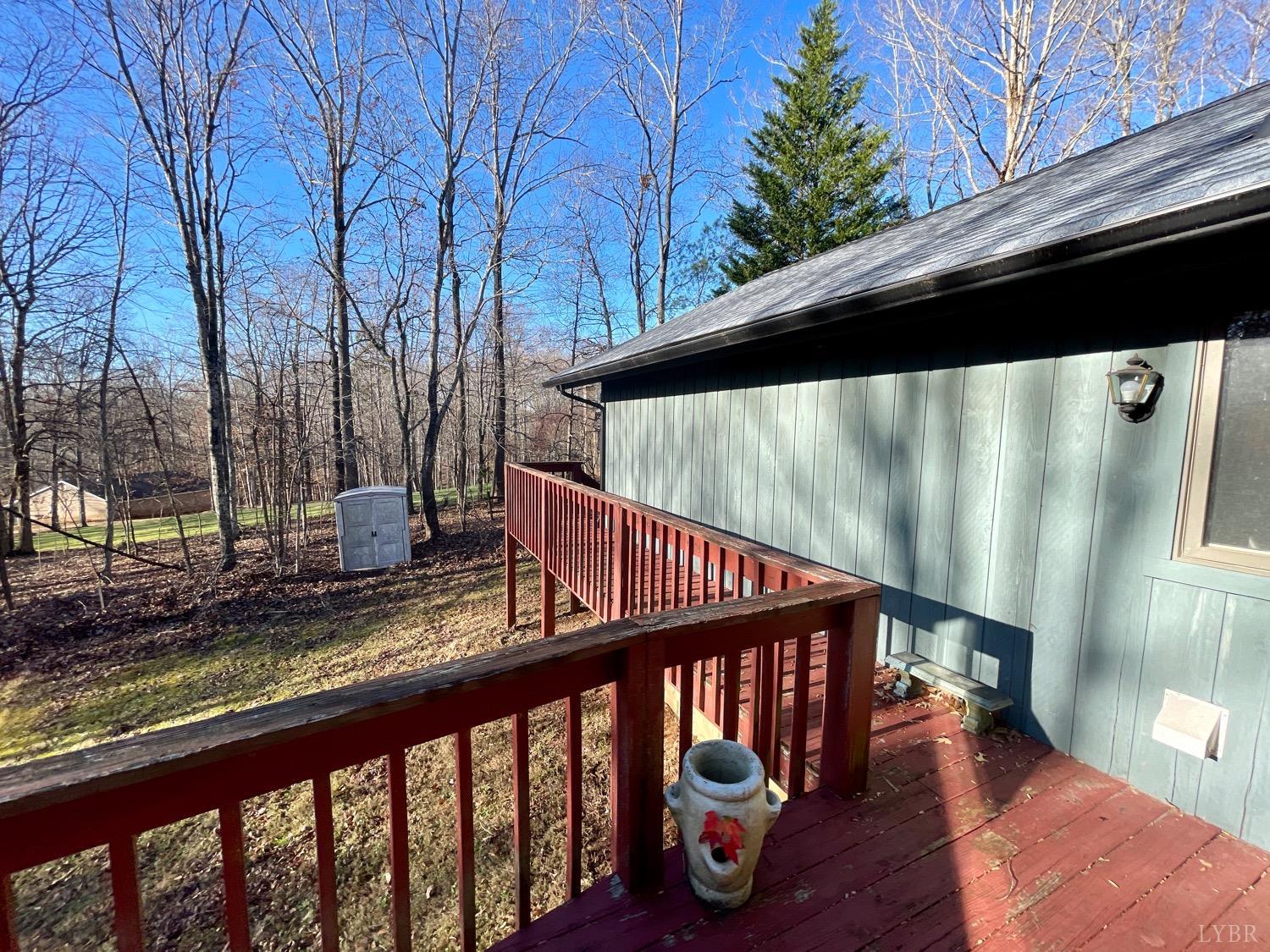 1739 Old Cifax Road Goode, VA 24556 - Photo 42 of 52 a view of balcony with wooden floor and fence