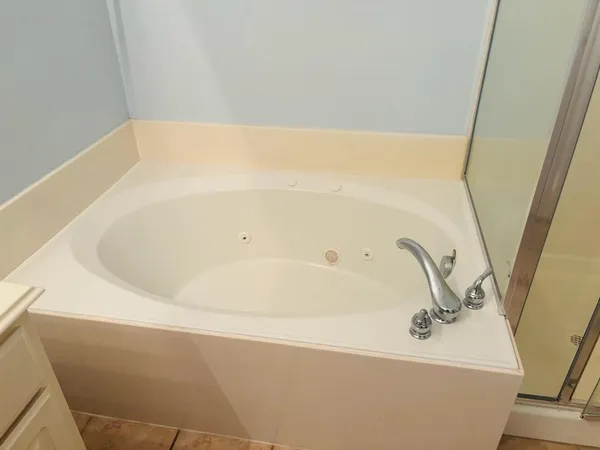 a bathroom with a bathtub
