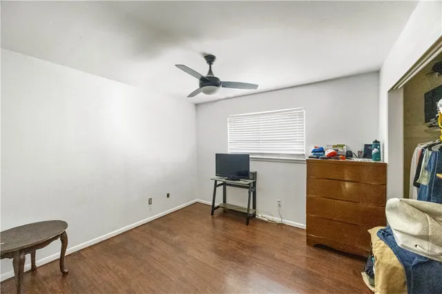 a workspace with furniture and a window