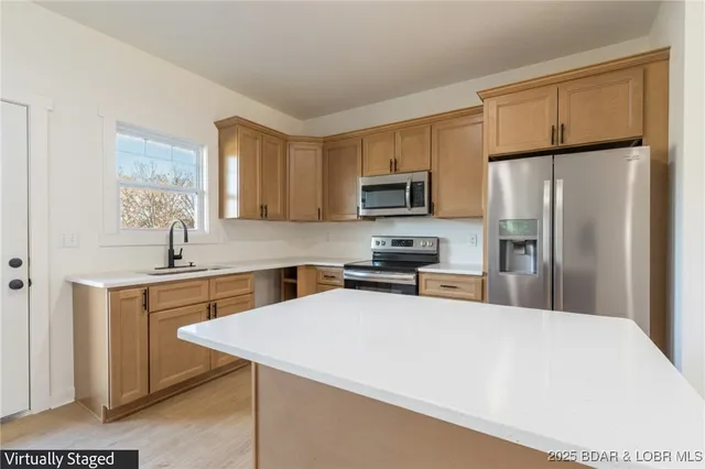 $375,000 | 12 Sam Drive, Kaiser, MO 65047